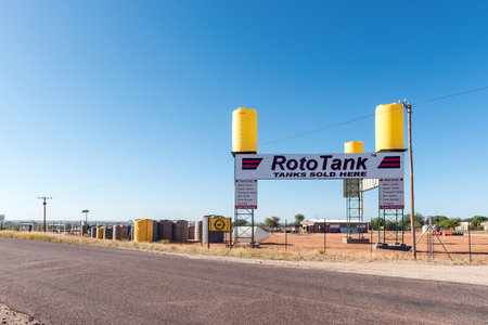 Upington, South Africa - Feb 25, 2023: A road scene, with a water tank retailer on road N14 near Upington in the Northern Cape Provinceのeditorial素材