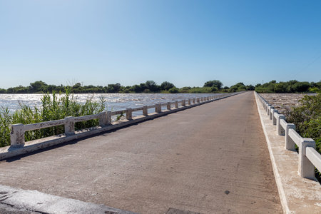The Manie Conradie Bridge over the flooded northern channel of the Orange River at Kononeiland near Upingtonの写真素材