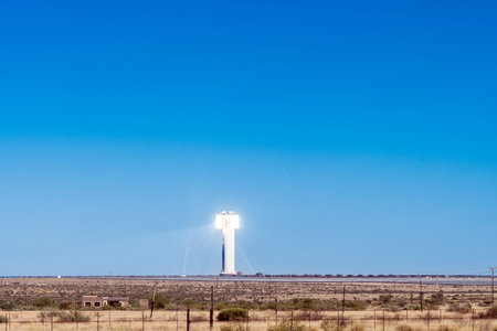 The Khi Solar One solar power plant near Upington in the Northern Cape Province. Light rays are...