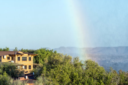 Augrabies National Park, South Africa - Feb 27, 2023: A rainbow is visible next to the office building at the Augrabies Falls National Parkのeditorial素材