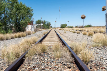 The railway station at Putsonderwater, a ghost town in the Northern Cape Province. A name board is visibleの素材 [FY310202430309]