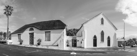 Bredasdorp, South Africa - Sep 23, 2022: A street scene, with the Shipwreck Museum, in Bredasdorp in the Western Cape Province. Monochromeのeditorial素材