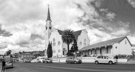 Napier, South Africa - Sep 23, 2022: A street scene in Napier in the Western Cape Province. The Dutch Reformed Church and the Shiloh Mother and Baby Clinic are visible. Monochromeのeditorial素材
