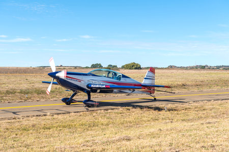 Bloemfontein, South Africa - May 20, 2023: An Extra 300L aircraft on a taxiway at the Tempe Airport in Bloemfonteinのeditorial素材