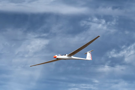 Bloemfontein, South Africa - May 20, 2023: A Janus B glider in the air at the Tempe Airport in Bloemfonteinのeditorial素材
