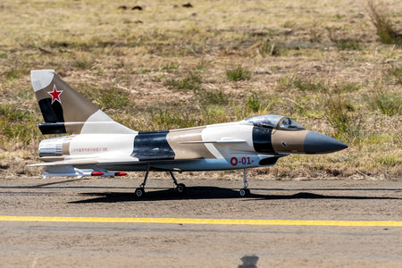 Bloemfontein, South Africa - May 20, 2023: A remote controlled jet fighter aircraft on a taxiway at the Tempe Airport in Bloemfonteinのeditorial素材