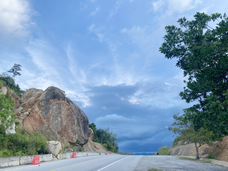 landscape of rocky mountain blue sky and clouds evening at narathiwat province thailand. landscape mountain tourism scenic scenery beautiful outdoor green hillpanoramic landscape sky.の写真素材