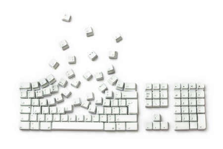 Keyboard Exploding - Keys Breakout isolated on whiteの写真素材
