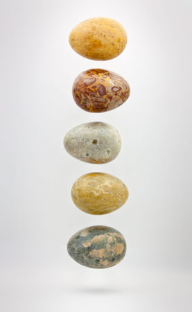 Five Stone Eggs Floating in mid airの写真素材