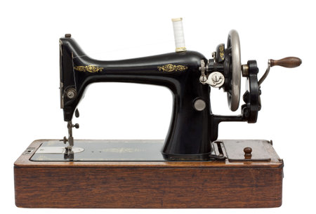 Antique Sewing Machine isolated on white with clipping path