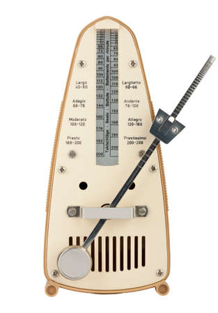 Metronome in motion isolated on whiteの写真素材