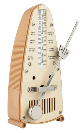 Metronome in motion isolated on whiteの写真素材