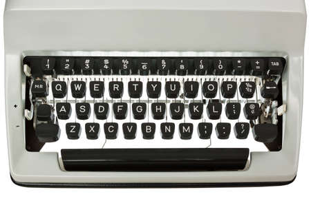 Backlit Typewriter keyboard. White text on black keys. Isolated on white with clipping pathの写真素材