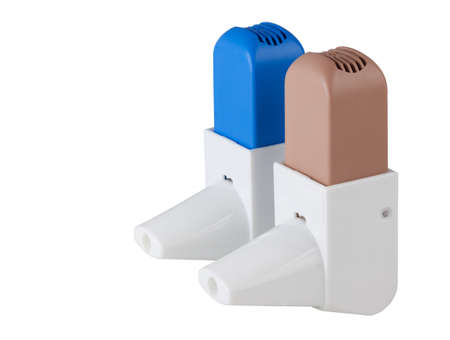 Blue and Brown Asthma Inhalers isolated on white with clipping pathの写真素材
