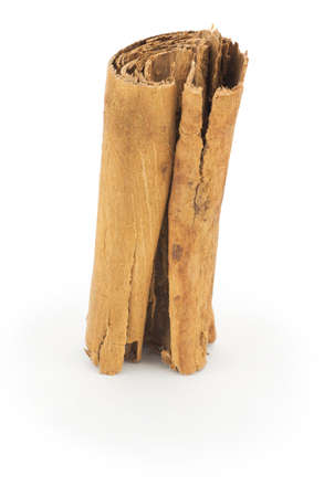 Cinnamon Stick close up on white backgroundの写真素材