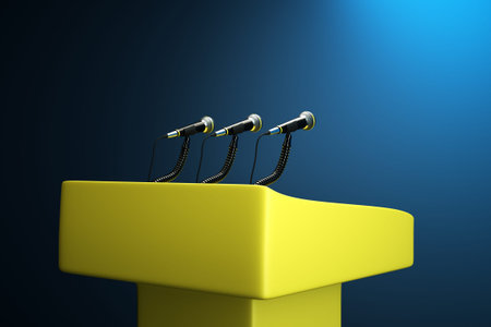 a  podium with microphonesの写真素材