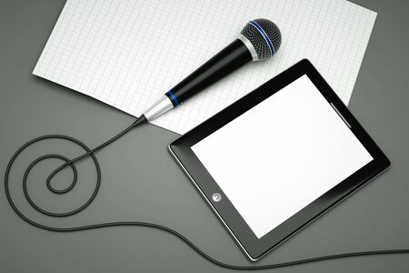 a tablet pc with compass on greyの写真素材