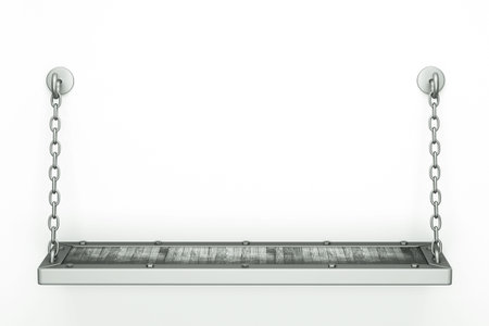 a modern bookshelf with silver chainsの写真素材