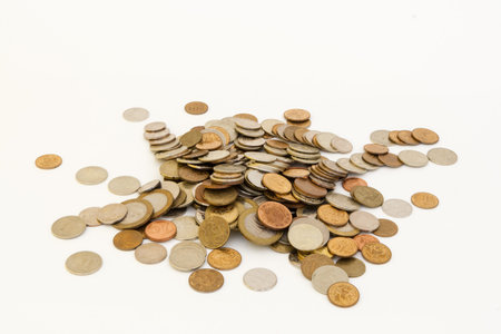 Coins of different metals of different denominations from different countriesの写真素材