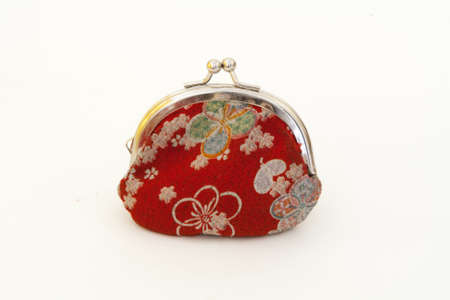 Old fashioned red purse with flowersの写真素材