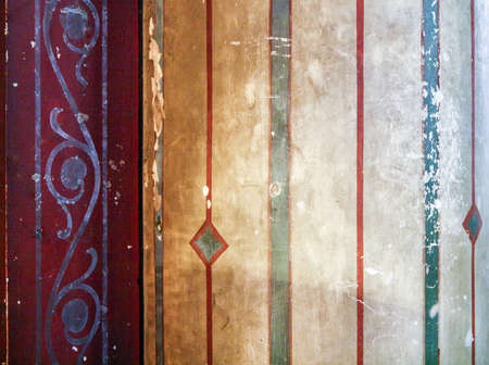 Peeling plaster with geometric pattern is not bright colorsの写真素材