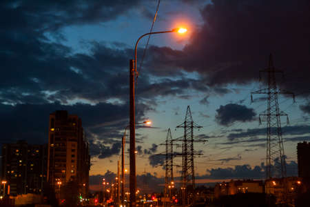 Evening sky with clouds over the industrial landscape with lanterns.の写真素材