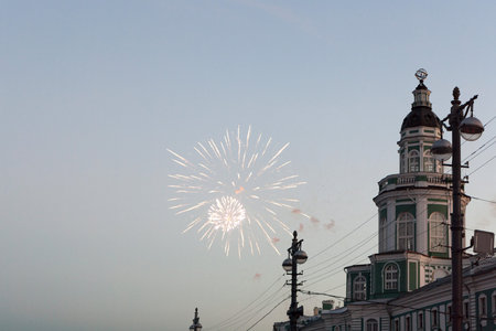 Fireworks near the green tower of the Kunstkammer on the Neva.