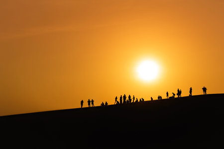People watching the sunset