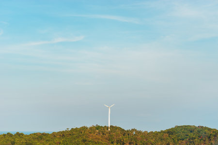 wind farm. wind energy. windpower. Sustainable, renewable energy. Windmill farm on mountain generate electricity. green technology. sustainable resources. copy spaceの写真素材
