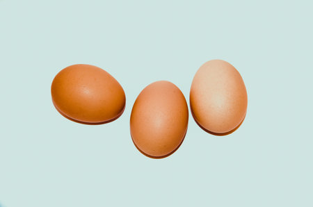three ordinary chicken eggs