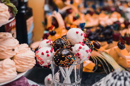Table with food for the holiday. Cuisine. Culinary Buffet. Dinner Catering. Dining Food. Celebration Party. Concept wedding birthday. Sweet pastries dessertsの写真素材