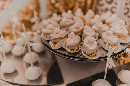 Table with food for the holiday. Cuisine. Culinary Buffet. Dinner Catering. Dining Food. Celebration Party. Concept wedding birthday. Sweet pastries dessertsの写真素材