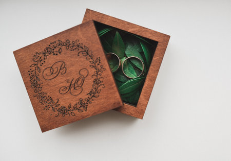 wedding rings bride and groom on the background. Wedding ceremony. Jewelry.