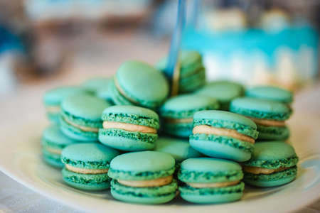 turquoise sweet macarons on a plate. Food candy. Colorfull delicious.の写真素材