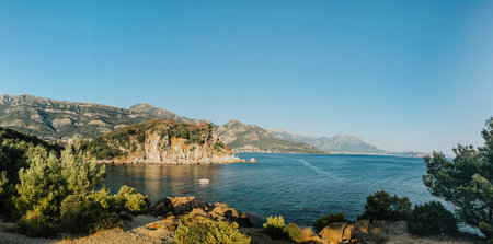 Top view Montenegro Sutomore stones beach blue turquoise Adriatic sea water mountains day. aerial...