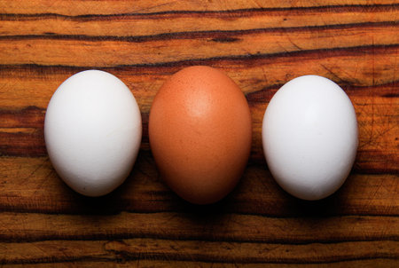 Eggs on wooden board