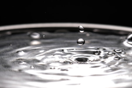 Water droplets and water splashes in macro photographyの写真素材