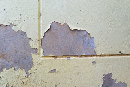 The house wall has stains and discoloration that has not been maintained for a long time.