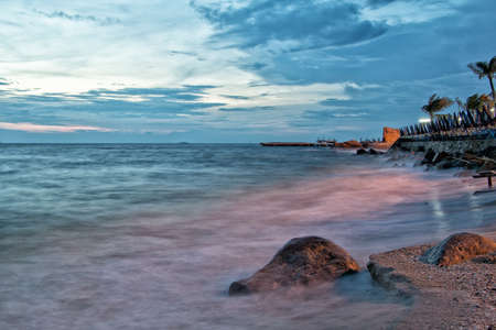 Dramatic Seascape Beach during sunset at Chonburi,Thailandの写真素材
