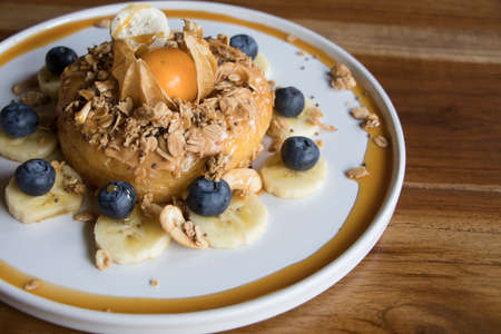 Close Up Shot Dessert Cake with Granola and Peanut Butterの写真素材