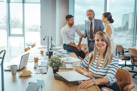 Group of business people working together in a modern office. Selective focus.