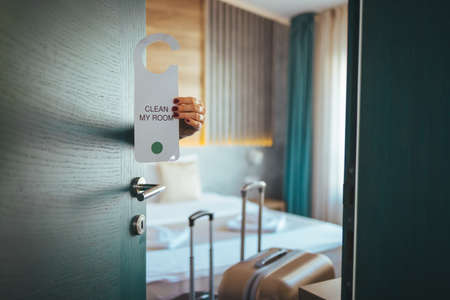 Do not disturb sign on the door of the hotel room. Hotel concept.の写真素材