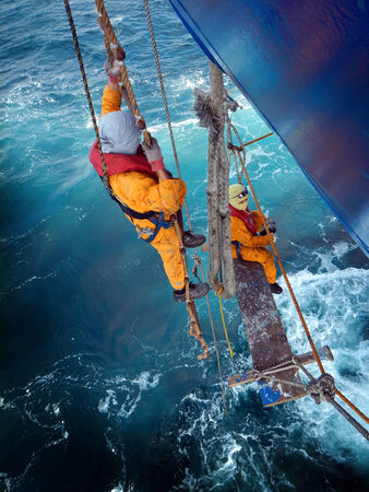 Two seamen working aloftの写真素材