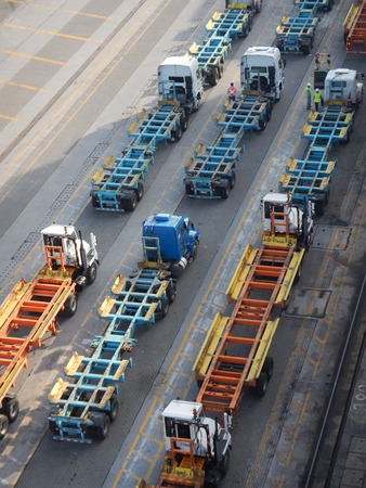 Cargo /container trucks waiting for loading of cargoのeditorial素材