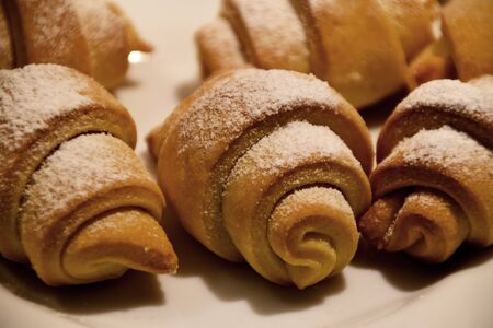 Butter cookies covered with powder sugar. Concept for food, homemade culinary publications.の写真素材
