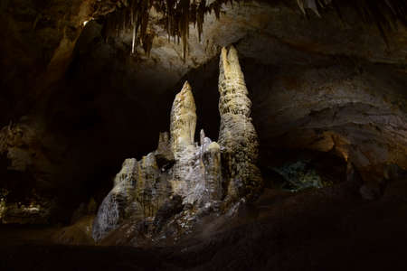 Inside Lipa cave, two large stalagmites which are called twins.
Stalagmite is a cylinder of calcium carbonate projecting upward from the floor of a limestone cave.の写真素材