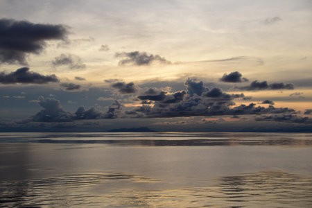 After the rain, sunset. Photo taken on approach to Papua New Guinea.の写真素材
