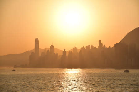 Early morning in Hong Kong. Beautiful golden sky.の写真素材