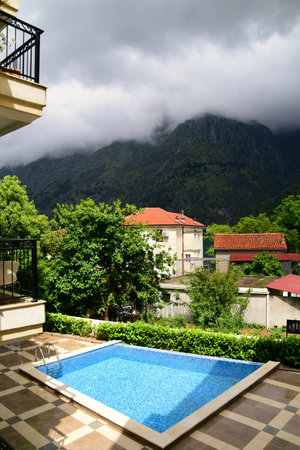 Luxury condominium and high mountainsの写真素材
