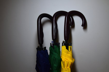 Blue, Green and yellow umbrella.の写真素材